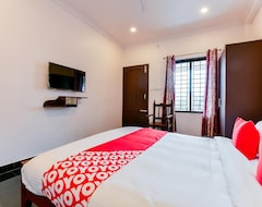 Hotel OYO 23106 Vattekad Tourist Home (Kochi, Indija)