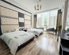 Khách sạn Riverside Select Hotel (Lushui, Trung Quốc)