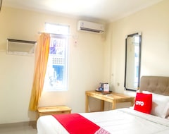 Khách sạn Oyo 3922 Wisma Minongga (Raha, Indonesia)