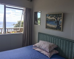 Toàn bộ căn nhà/căn hộ Little Bay Beach Bach Great Views (Waikino, New Zealand)