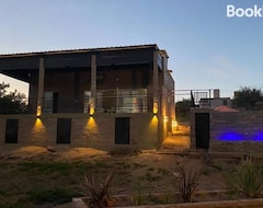 Entire House / Apartment Chalet De Siquiman (Villa Urquiza, Argentina)