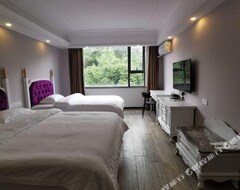 Xing'an Milannuo Business Hotel (Guilin, Kina)