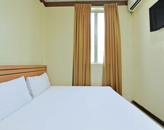 Hotel Spot On 92255 Lucky Guesthouse (Pekanbaru, Indonezija)