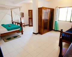 Otel Flame Tree Cottages (Nungwi, Tanzanya)