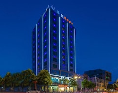 Junyue Business Hotel (Lingao, Kina)