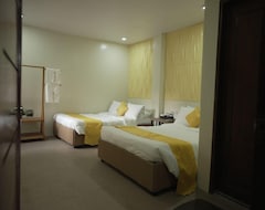 Hotel Oyo 1063 Manuelas Suites (Puerto Princesa, Filipini)