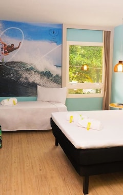 Delphin Surf Hotel (Guarujá, Brasil)