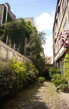 Casa/apartamento entero Small studio in private green alley in the heart of Paris (París, Francia)