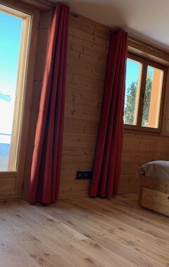 Hele huset/lejligheden Luxury family chalet Ski-in/Ski-out -Fireplace-Giant Sundeck -Jacuzzi -Steam Roo (Huez, Frankrig)