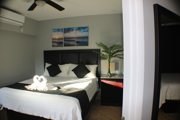 The All New Grace Bay Suites